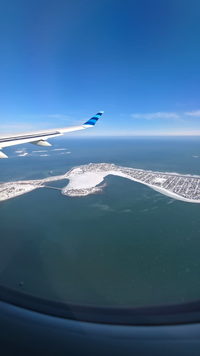 Aerial View of Snowy Coastline
